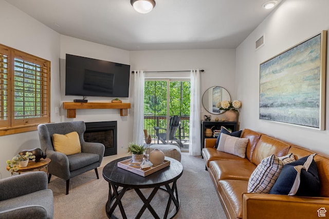 5519 Lillehammer Ln Unit 1307, Park City, UT 84098 - carpeted living area with plenty of natural light and a fireplace