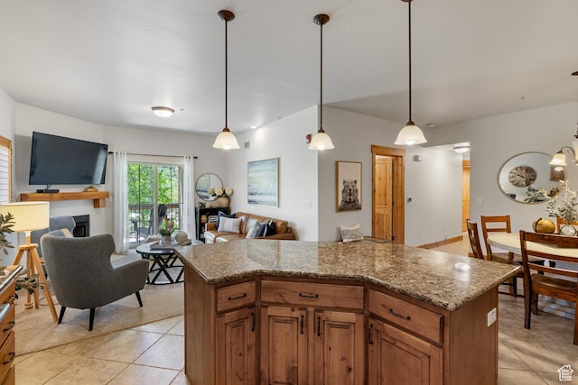 5519 Lillehammer Ln Unit 1307, Park City, UT 84098 - kitchen featuring light tile patterned floors, open floor plan, and decorative light fixtures
