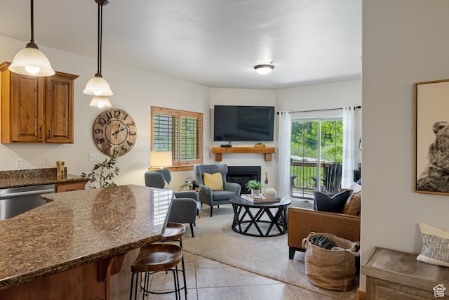 5519 Lillehammer Ln Unit 1307, Park City, UT 84098 - living area with light tile patterned flooring and a fireplace