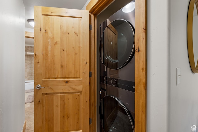 5519 Lillehammer Ln Unit 1307, Park City, UT 84098 - laundry area featuring estacked washer and dryer and tile patterned flooring