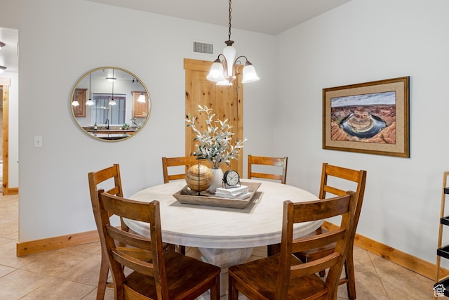 5519 Lillehammer Ln Unit 1307, Park City, UT 84098 - dining space with light tile patterned floors, a chandelier, and baseboards