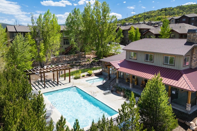 5519 Lillehammer Ln Unit 1307, Park City, UT 84098 - community pool with a pergola, a patio area, and a residential view