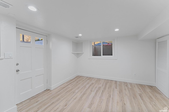 1167 29th St, Ogden, UT 84403 - below grade area with light wood finished floors, recessed lighting, and baseboards