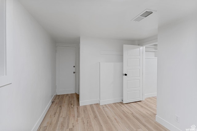 1167 29th St, Ogden, UT 84403 - empty room featuring light wood-style floors and baseboards