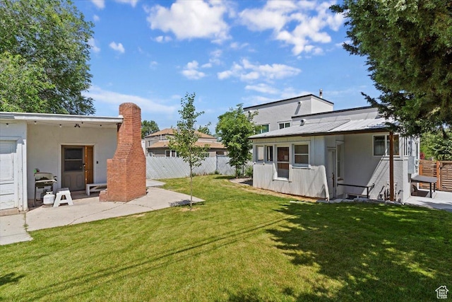 1167 29th St, Ogden, UT 84403 - view of yard with a patio