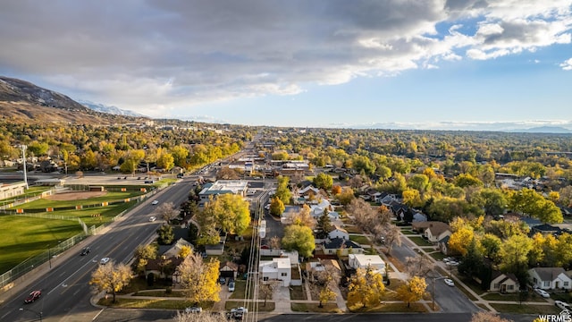 1167 29th St, Ogden, UT 84403 - aerial view of property and surrounding area featuring nearby suburban area and mountains