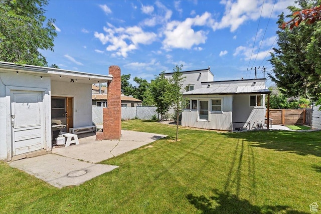 1167 29th St, Ogden, UT 84403 - view of yard with a patio