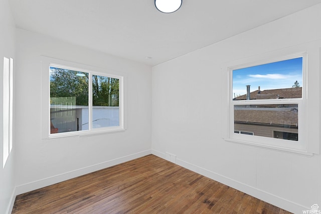 1167 29th St, Ogden, UT 84403 - unfurnished room featuring wood finished floors and baseboards