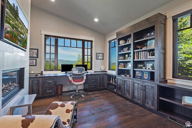 3428 Westview Trl, Park City, UT 84098 - office featuring vaulted ceiling, dark wood-style flooring, recessed lighting, built in desk, and a fireplace