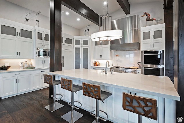 3428 Westview Trl, Park City, UT 84098 - kitchen featuring a sink, wall chimney range hood, appliances with stainless steel finishes, beam ceiling, and dark wood finished floors