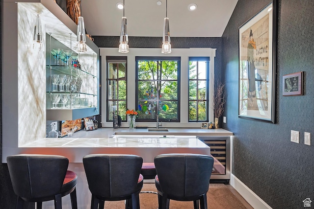 3428 Westview Trl, Park City, UT 84098 - bar featuring beverage cooler, recessed lighting, and hanging light fixtures