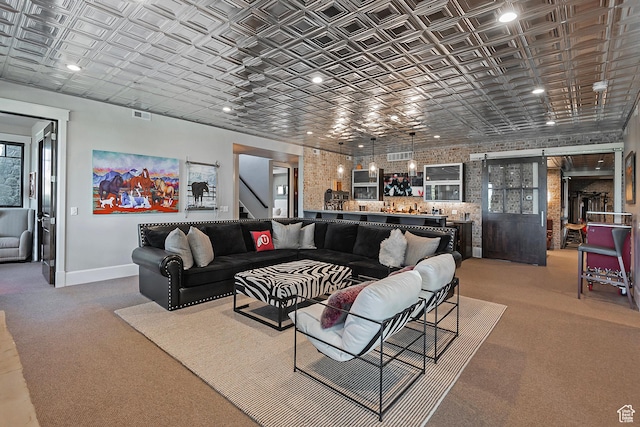 3428 Westview Trl, Park City, UT 84098 - living room with a barn door, an ornate ceiling, carpet, baseboards, and recessed lighting
