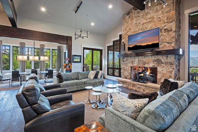3428 Westview Trl, Park City, UT 84098 - living room featuring beamed ceiling, healthy amount of natural light, a fireplace, wood finished floors, and high vaulted ceiling