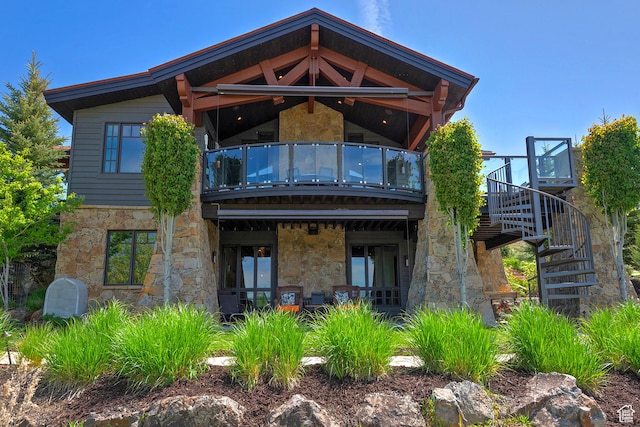 3428 Westview Trl, Park City, UT 84098 - rear view of house with a balcony, stone siding, and stairs