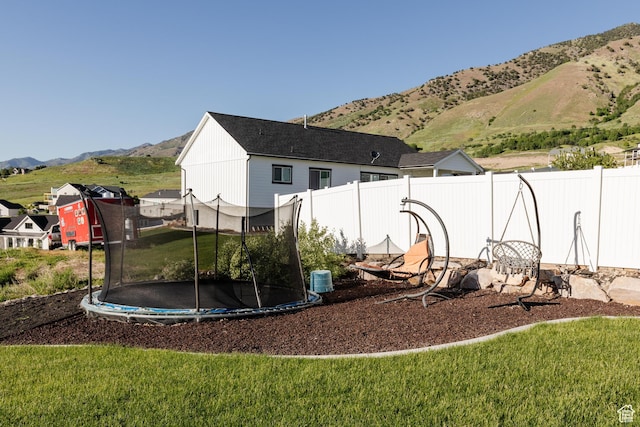 611 E 400 N, Providence, UT 84332 - view of property exterior featuring a trampoline and a mountain view