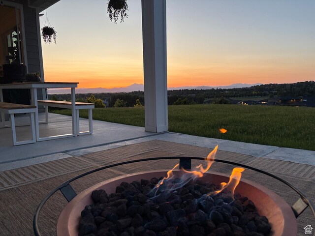 611 E 400 N, Providence, UT 84332 - patio terrace at dusk featuring a fire pit