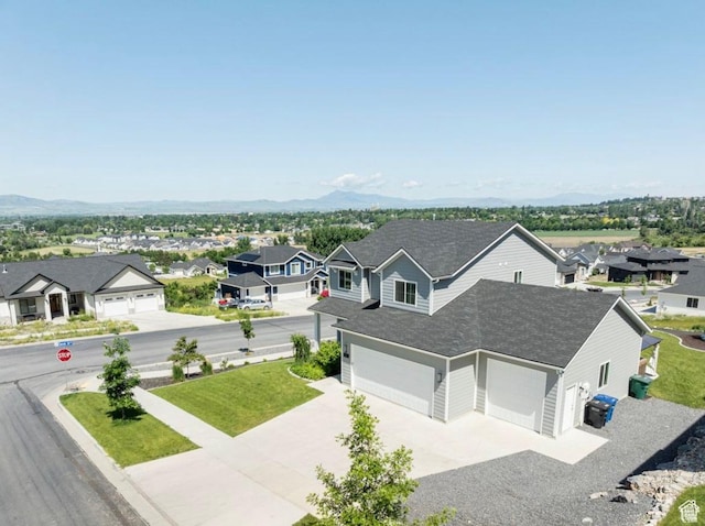 611 E 400 N, Providence, UT 84332 - aerial view of residential area with a mountain backdrop