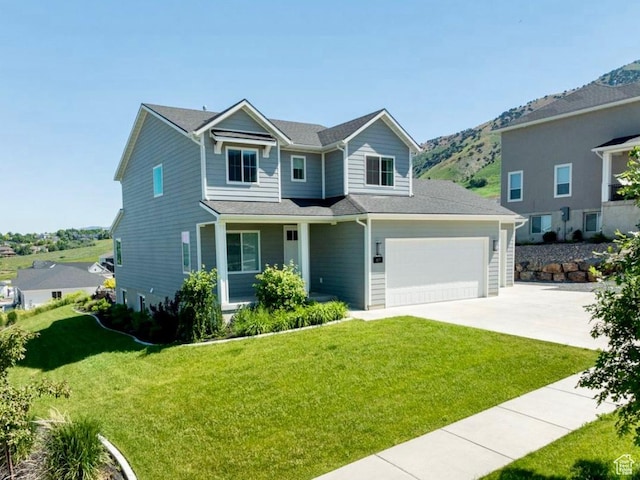 611 E 400 N, Providence, UT 84332 - view of front of property featuring concrete driveway and a front lawn