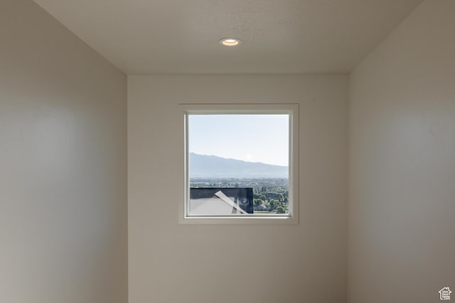 611 E 400 N, Providence, UT 84332 - empty room featuring healthy amount of natural light, recessed lighting, and a mountain view