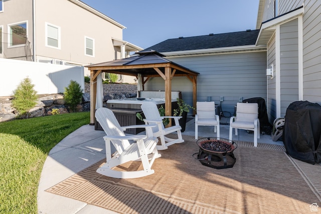611 E 400 N, Providence, UT 84332 - view of patio featuring a hot tub, a fire pit, a gazebo, and grilling area