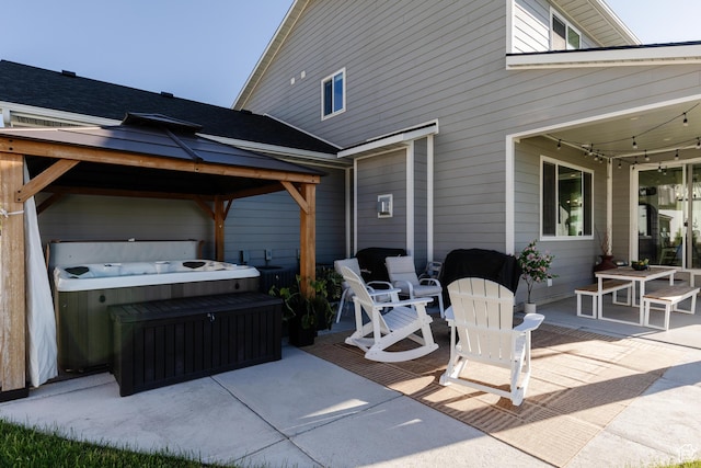 611 E 400 N, Providence, UT 84332 - view of patio featuring a hot tub and a gazebo