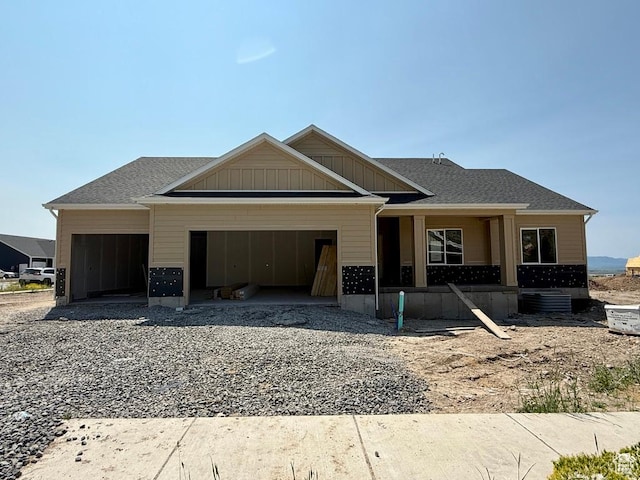 1235 N 1380 E, Logan, UT 84341 - view of front of home with a garage and gravel driveway