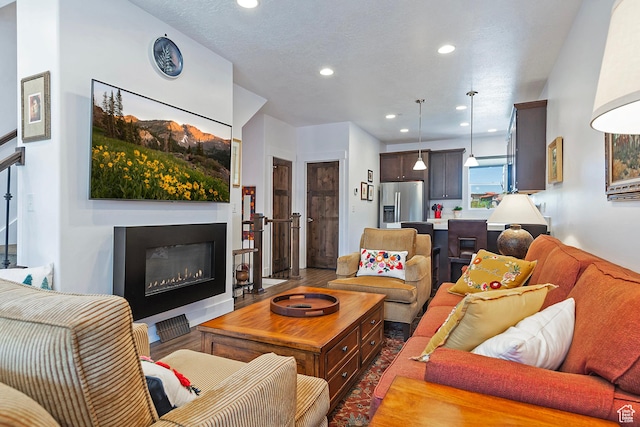 1370 Center Dr Unit 17, Kimball Junction, UT 84098 - living room with recessed lighting and a glass covered fireplace