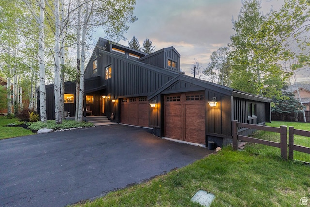 2126 Twilight Ct, Park City, UT 84060 - view of front of home with board and batten siding, asphalt driveway, and a garage