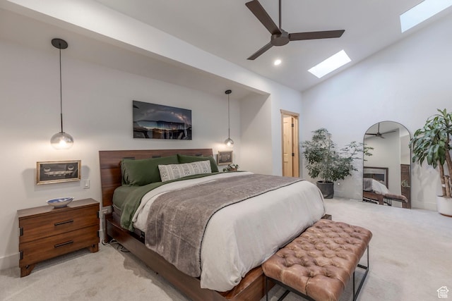 2126 Twilight Ct, Park City, UT 84060 - bedroom featuring a skylight, light carpet, high vaulted ceiling, and ceiling fan
