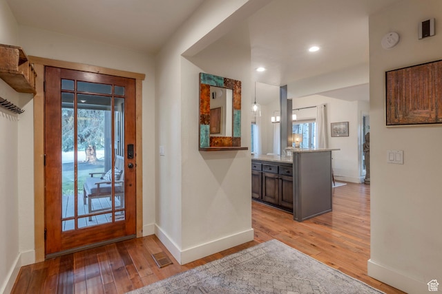 2126 Twilight Ct, Park City, UT 84060 - foyer with light wood finished floors, baseboards, and recessed lighting