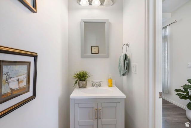 723 E 380 S, American Fork, UT 84003 - bathroom featuring vanity, wood finished floors, and baseboards