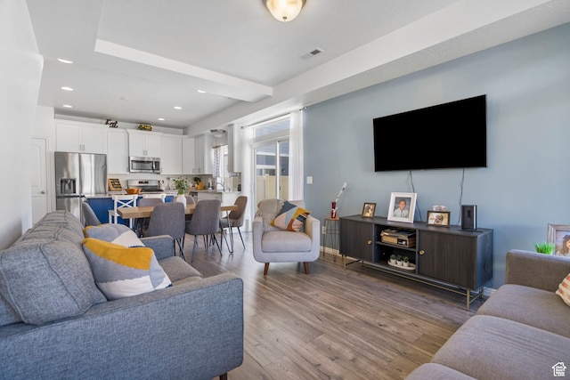 723 E 380 S, American Fork, UT 84003 - living room featuring wood finished floors and recessed lighting
