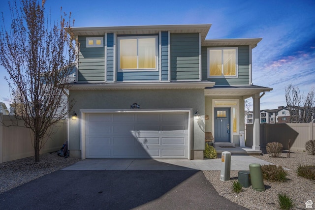 723 E 380 S, American Fork, UT 84003 - view of front of property featuring driveway, a garage, and stucco siding