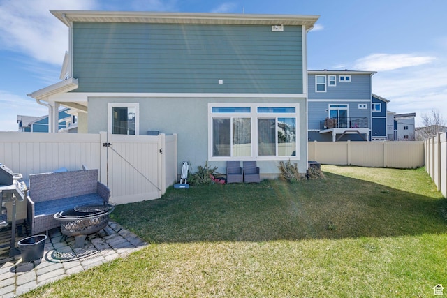 723 E 380 S, American Fork, UT 84003 - rear view of property with a gate, an outdoor fire pit, stucco siding, and a patio area