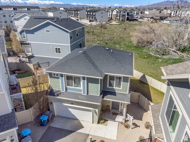 723 E 380 S, American Fork, UT 84003 - back of property with a shingled roof, a residential view, a mountain view, a garage, and driveway