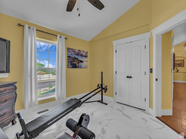 1872 N 1850 E, North Logan, UT 84341 - exercise area with vaulted ceiling, ceiling fan, light marble finish flooring, and baseboards