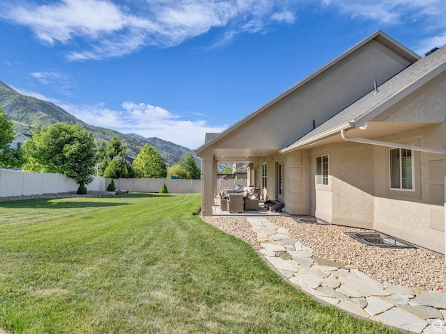 1872 N 1850 E, North Logan, UT 84341 - view of yard featuring an outdoor hangout area, a mountain view, and a patio