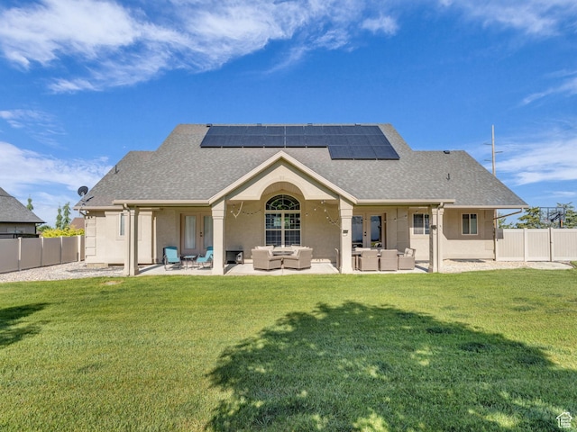 1872 N 1850 E, North Logan, UT 84341 - back of house featuring outdoor lounge area, solar panels, french doors, and roof with shingles