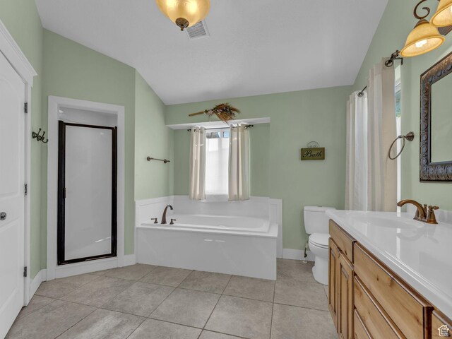 1872 N 1850 E, North Logan, UT 84341 - full bath featuring vaulted ceiling, a garden tub, toilet, vanity, and baseboards