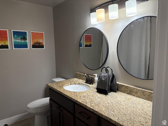 239 N 2400 E, Spanish Fork, UT 84660 - bathroom featuring vanity, toilet, and tile patterned floors