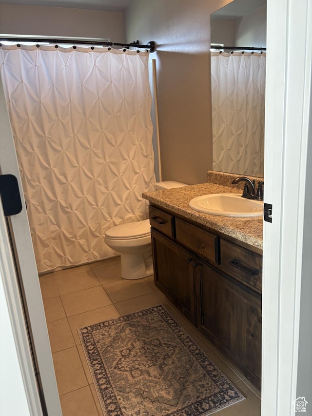 239 N 2400 E, Spanish Fork, UT 84660 - bathroom with toilet, tile patterned floors, and vanity