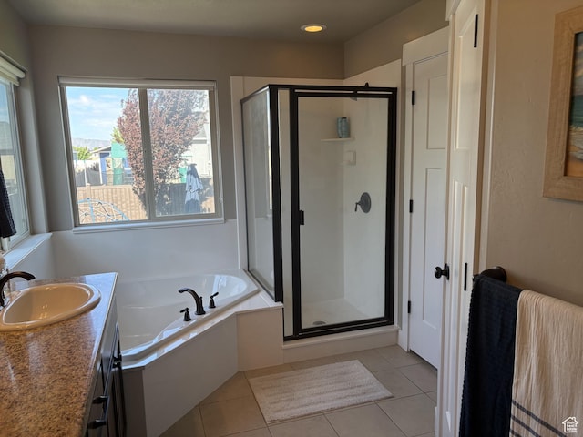 239 N 2400 E, Spanish Fork, UT 84660 - bathroom with a shower stall, a bath, plenty of natural light, tile patterned flooring, and recessed lighting