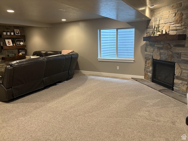 239 N 2400 E, Spanish Fork, UT 84660 - living room featuring baseboards, carpet floors, a stone fireplace, and recessed lighting