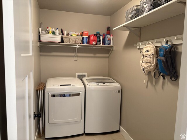 239 N 2400 E, Spanish Fork, UT 84660 - laundry room featuring washer and dryer and light tile patterned flooring