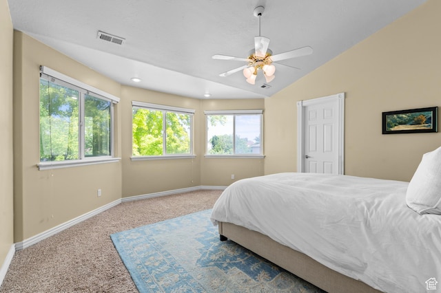 12064 S Fastback Cir, Riverton, UT 84065 - bedroom with carpet, baseboards, vaulted ceiling, and a ceiling fan
