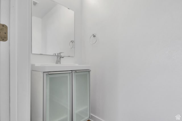 185 W 700 S Unit 101, Salt Lake City, UT 84101 - bathroom with vanity and baseboards