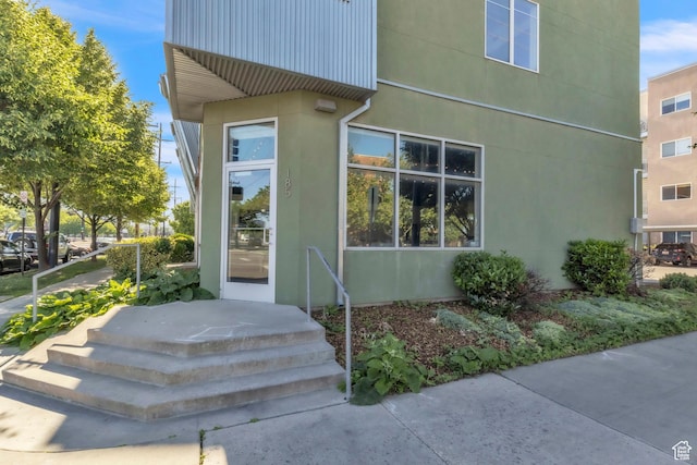 185 W 700 S Unit 101, Salt Lake City, UT 84101 - doorway to property with stucco siding