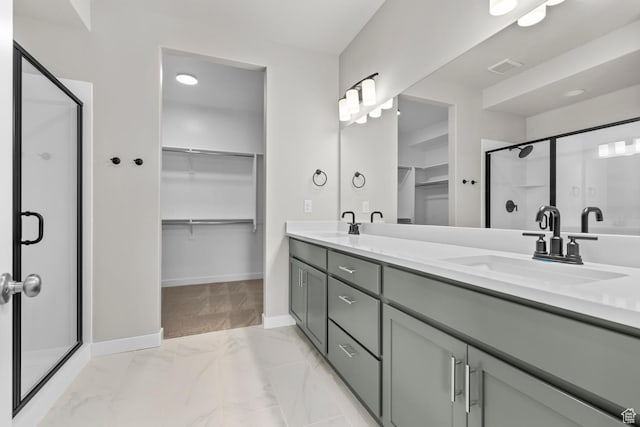 746 W Signal Dr, Salt Lake City, UT 84123 - bathroom with a spacious closet, a shower stall, double vanity, and baseboards