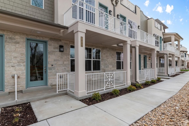 746 W Signal Dr, Salt Lake City, UT 84123 - property entrance with a porch and stone siding