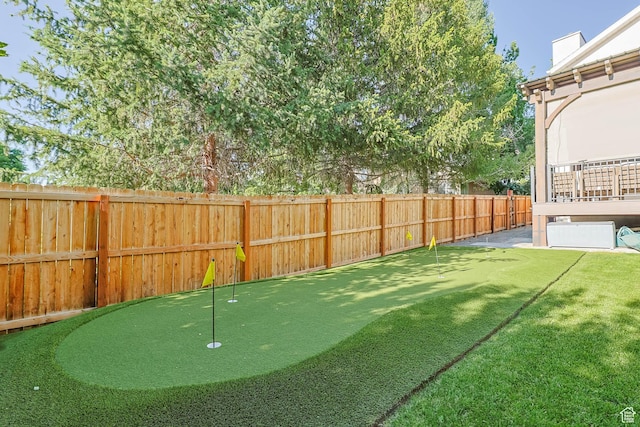 9574 S Equestrian Park Cir, Sandy, UT 84092 - fenced backyard featuring a putting green